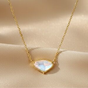 Elegant Gold Necklace with Iridescent Pendant